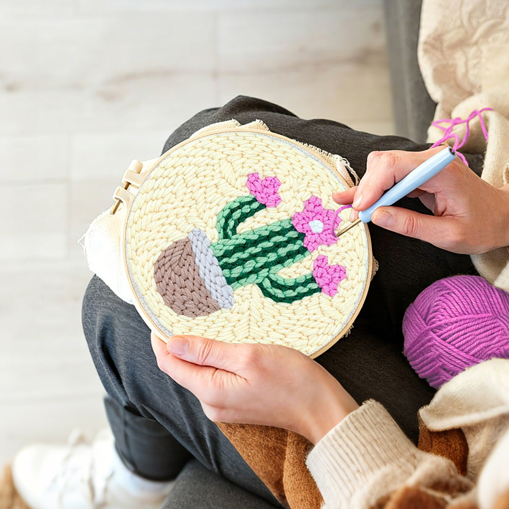Creating handmade cpink blooming cactus punch needle artwork
