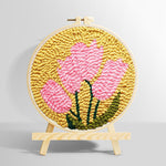 Pink blooms on mustard yellow background punch needle kit for beginners