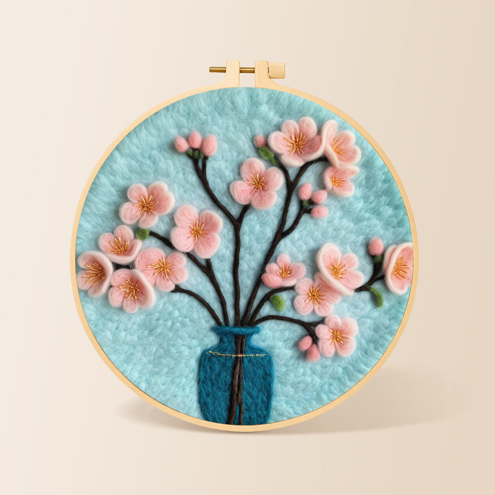 Pink blossom in blue vase needle felting kit for beginners with a round wooden frame