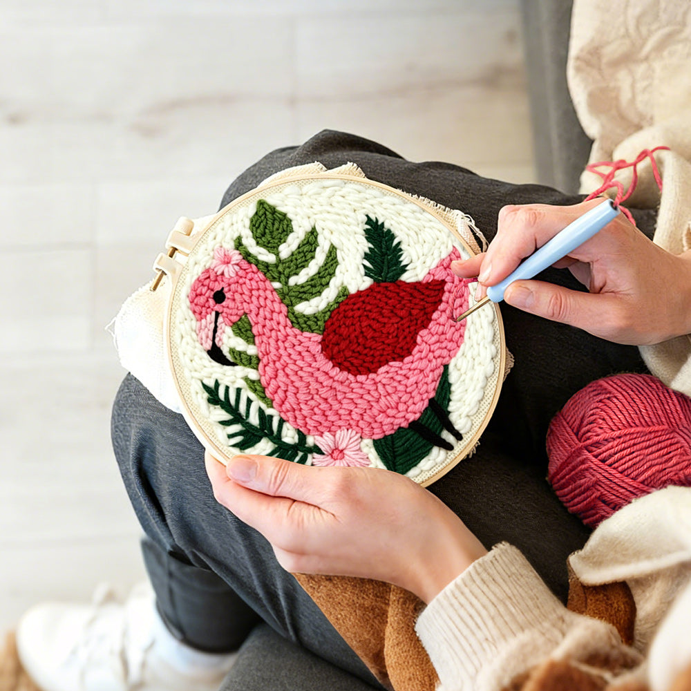 Creating handmade pink flamingo and green plants punch needle artwork
