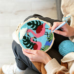 Creating handmade pink flamingo couple punch needle artwork