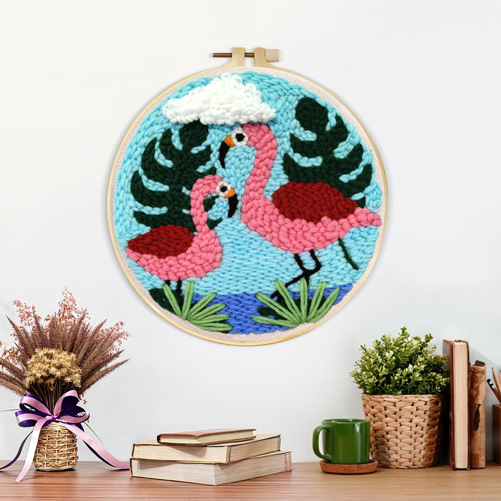 Finished pink flamingo couple artwork displayed on a wall