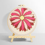 Pink geometric sunburst flower punch needle kit for beginners