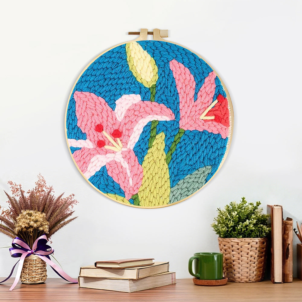 Finished pink lilies artwork displayed on a wall