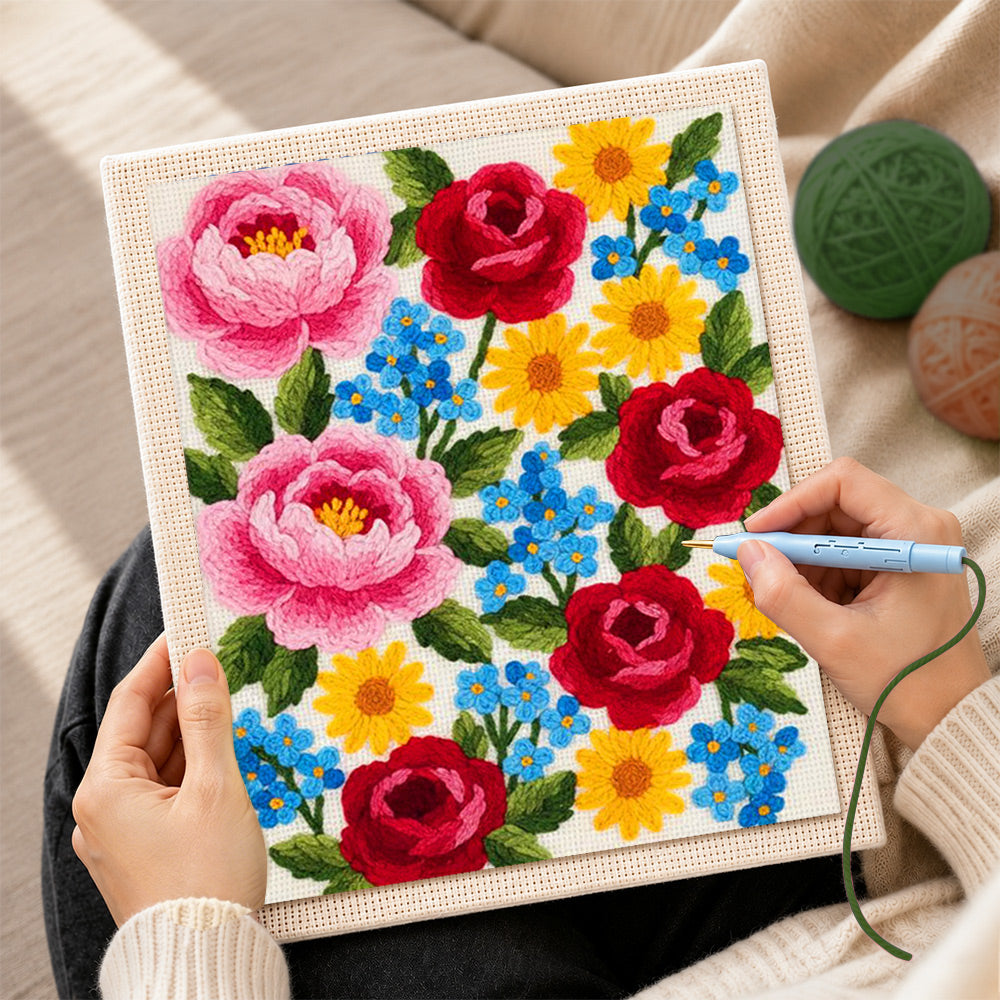 Creating handmade pink peonies, red roses and blue forget-me-nots punch needle artwork