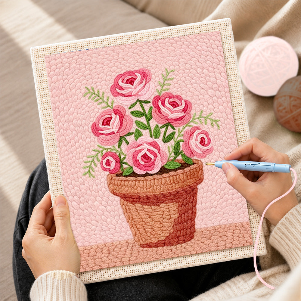 Creating handmade pink roses in pot punch needle artwork