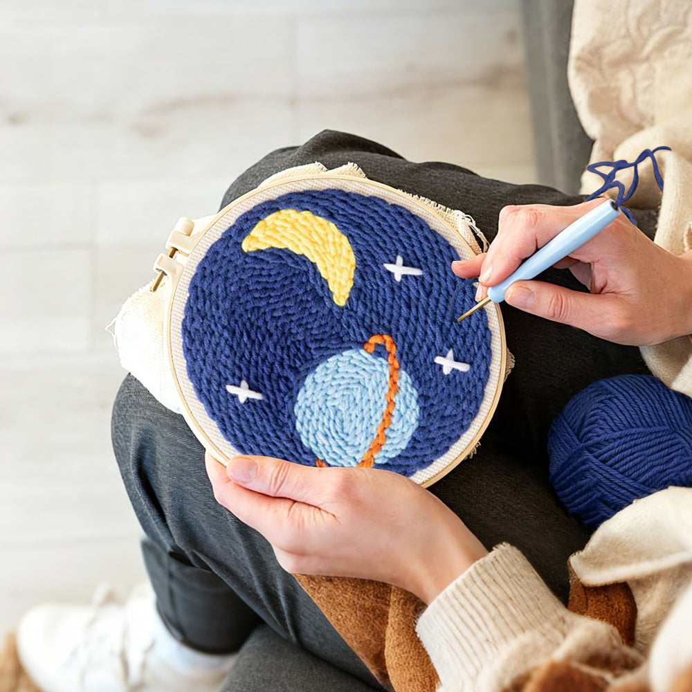 Creating handmade planet, crescent moon and stars punch needle artwork