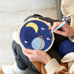 Creating handmade planet, crescent moon and stars punch needle artwork