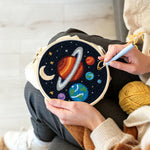 Creating handmade planets and moon solar system punch needle artwork