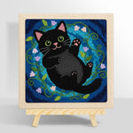 Playful black cat with flowers punch needle kit for beginners