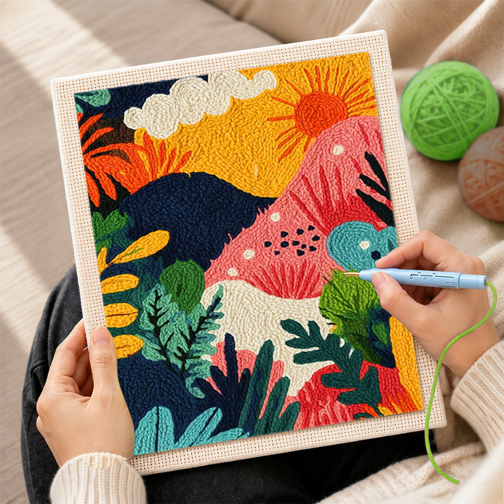 Creating handmade playful jungle sunset scene punch needle artwork