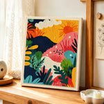 Playful jungle sunset scene punch needle artwork displayed on a table