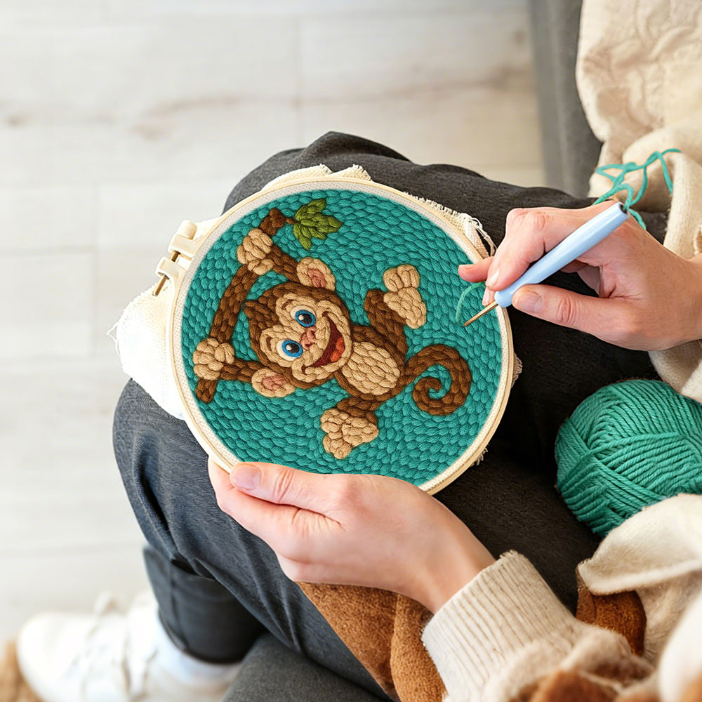 Creating handmade playful little monkey punch needle artwork
