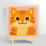 Playful orange cat waving paw punch needle kit for beginners