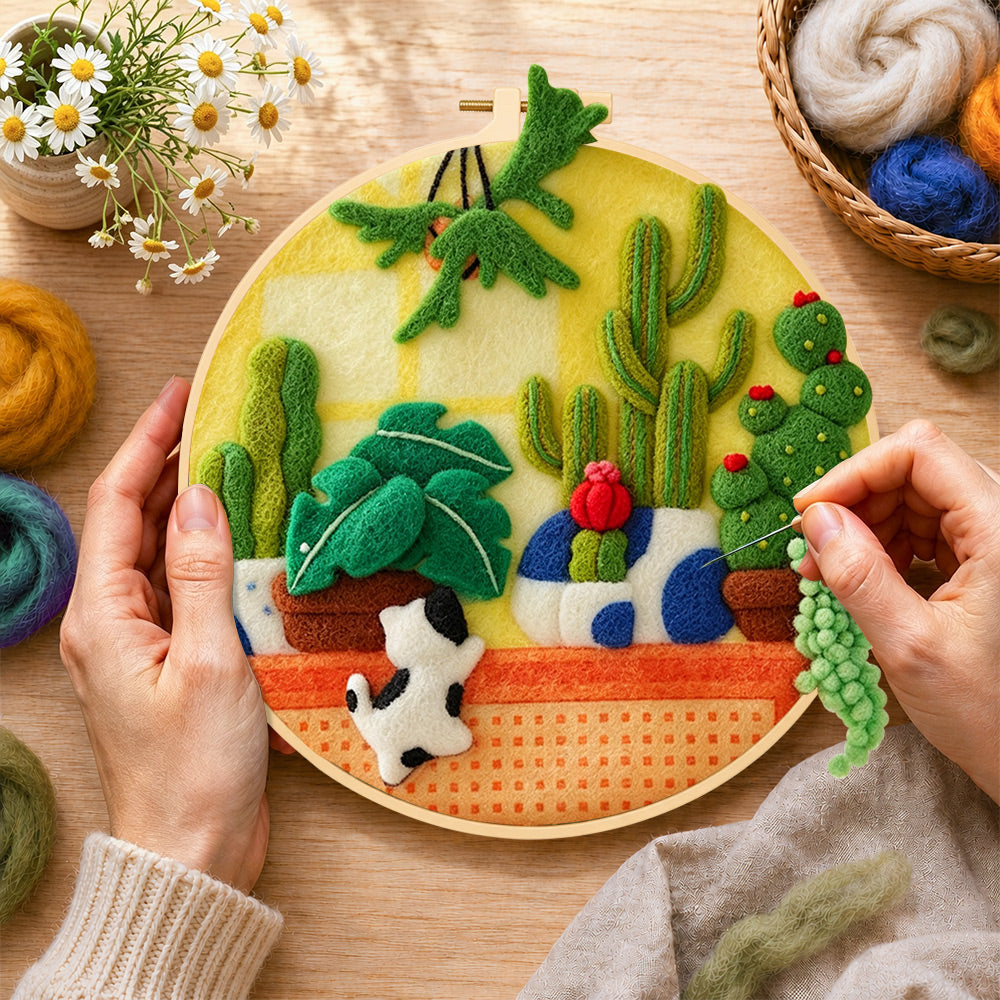 Creating the potted cacti of various shapes wool painting by hand with a felting needle