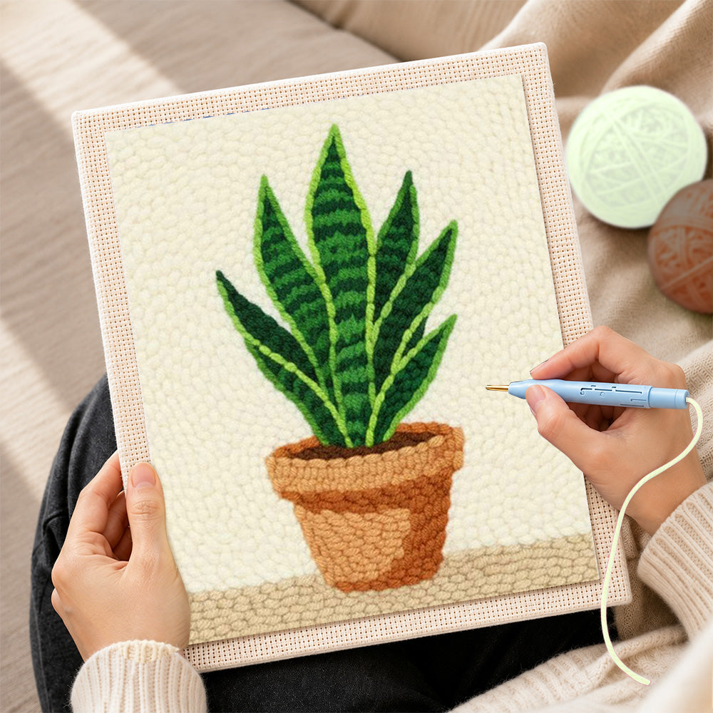 Creating handmade potted snake plant punch needle artwork