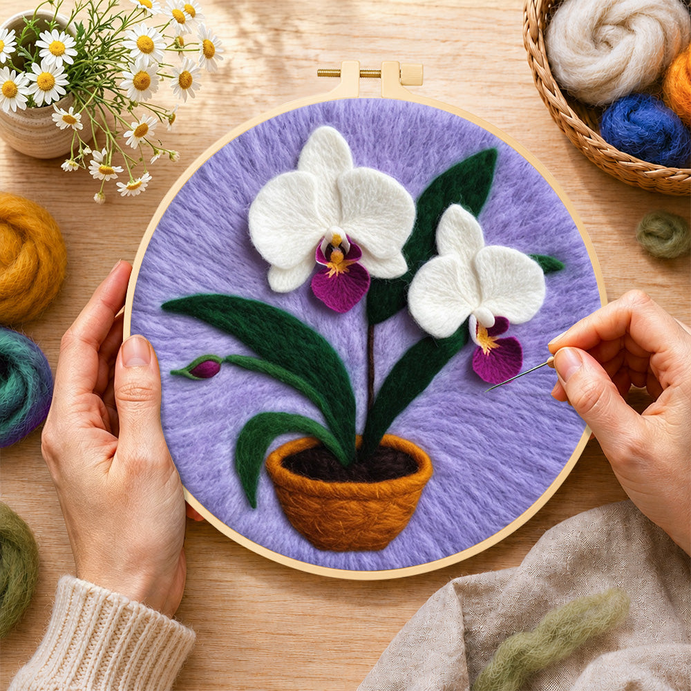 Creating the potted white orchid wool painting by hand with a felting needle