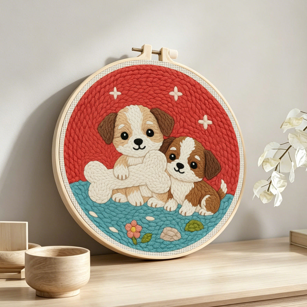 Puppies with bone punch needle artwork displayed on a table