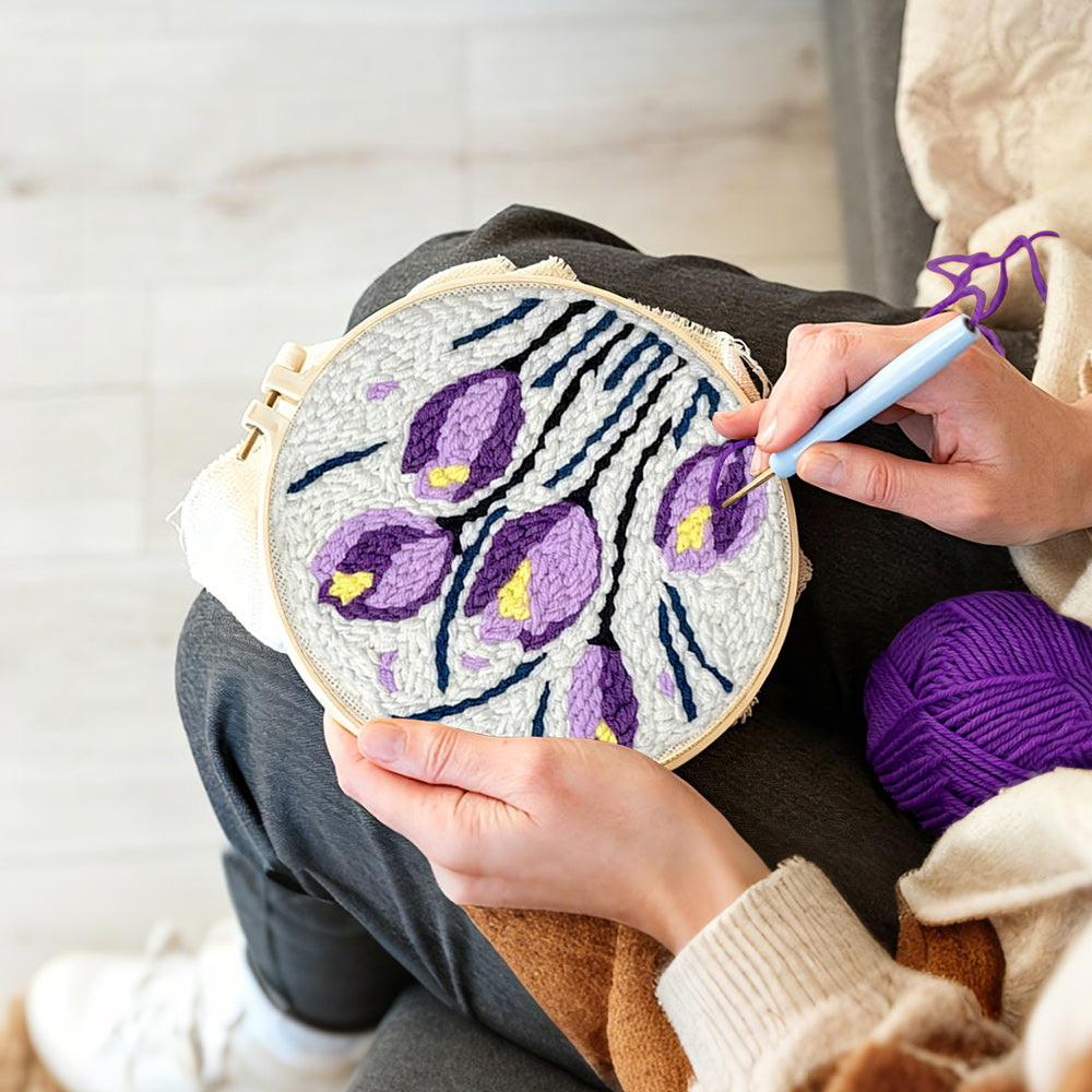 Creating handmade purple and yellow tulip blooms punch needle artwork