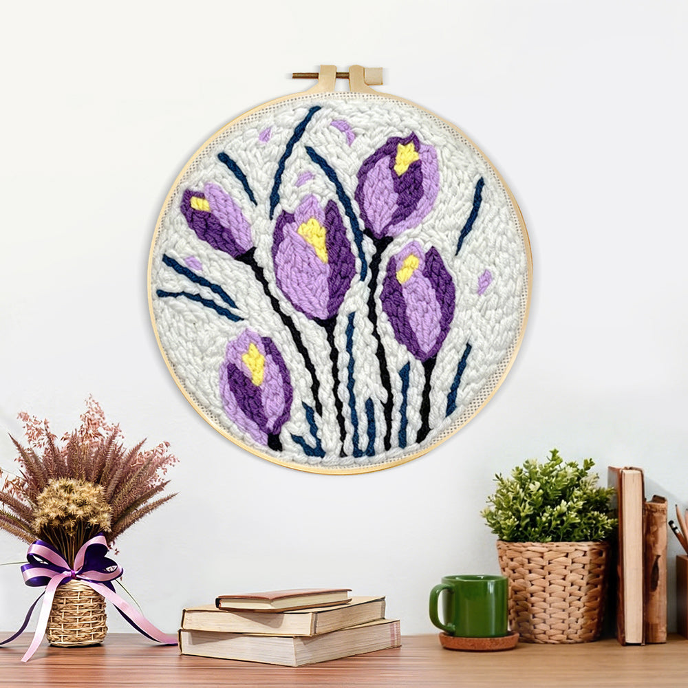 Finished purple and yellow tulip blooms artwork displayed on a wall
