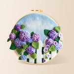 Purple hydrangeas on fence needle felting kit for beginners with a round wooden frame