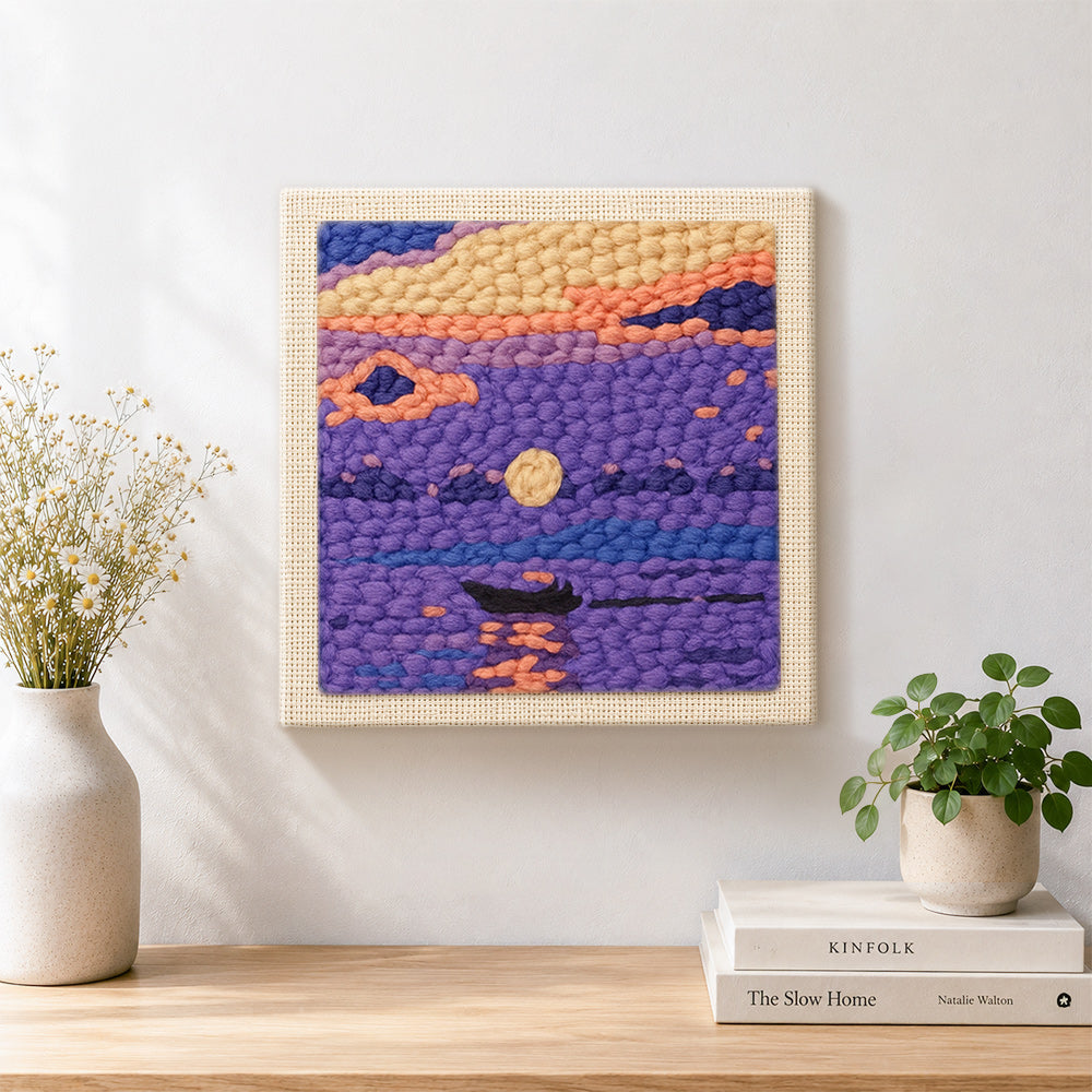 Finished purple lake and little boat artwork displayed on a wall