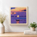 Finished purple lake and little boat artwork displayed on a wall