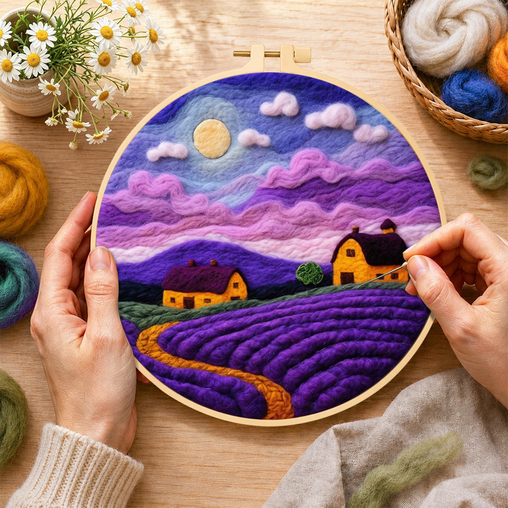Creating the purple lavender fields under the moon wool painting by hand with a felting needle