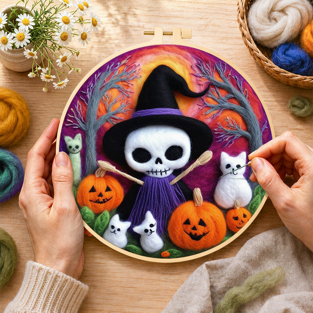 Creating the purple skull witch with broom wool painting by hand with a felting needle