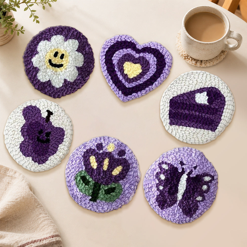 Purple smiley flower, butterfly and heart punch needle coasters used for home decoration