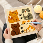 Creating handmade quirky multi-coloured kitty punch needle artwork