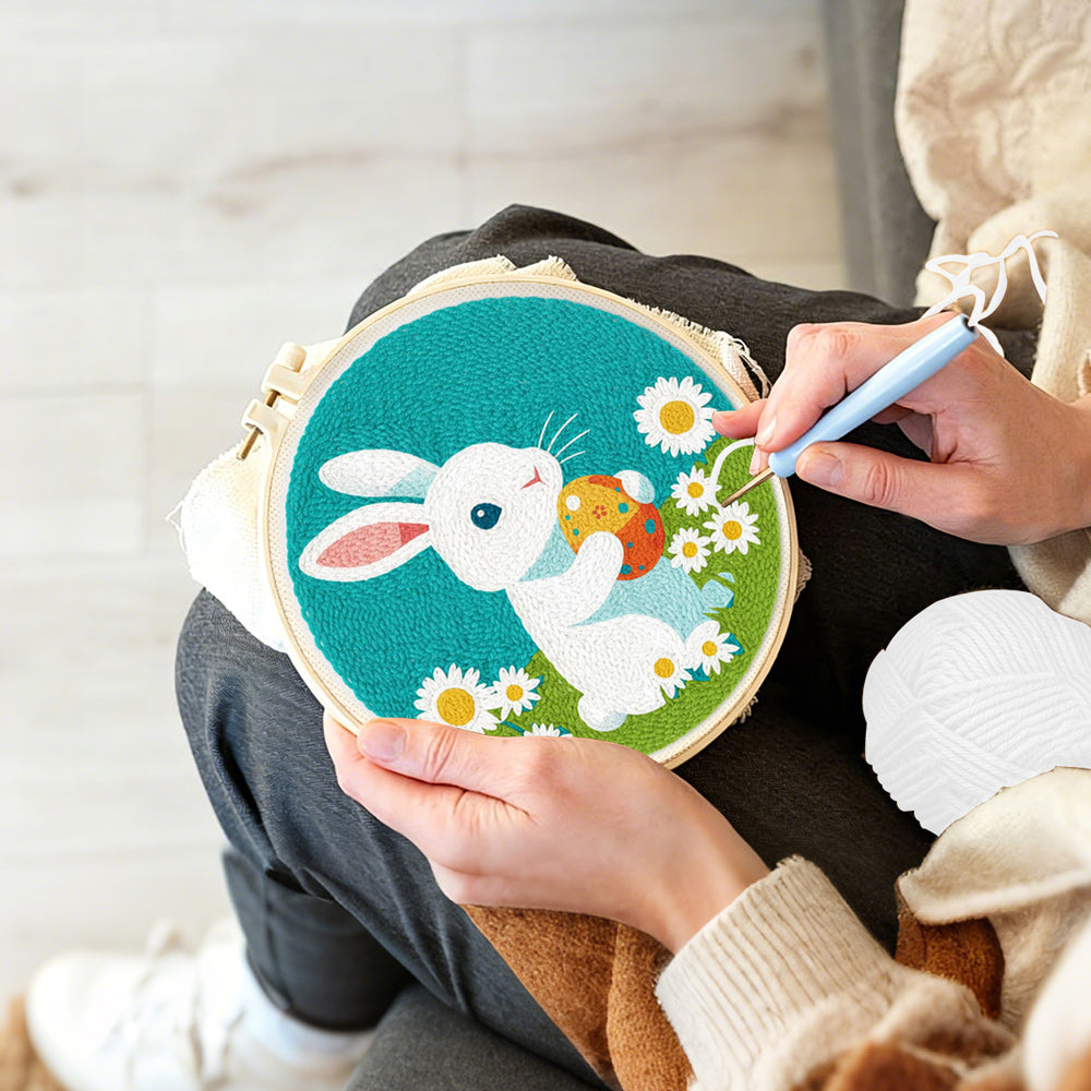 Creating handmade rabbit with easter egg punch needle artwork