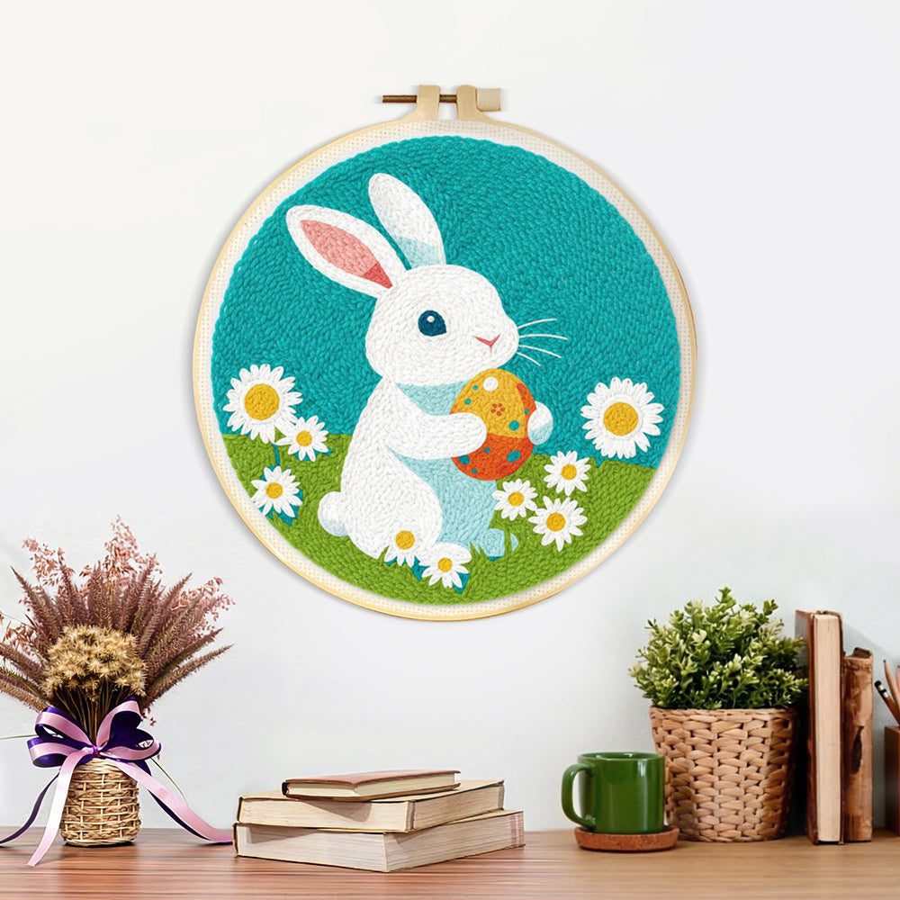 Finished rabbit with easter egg artwork displayed on a wall