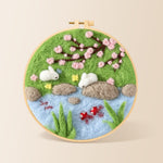 Rabbits fishing under cherry blossoms needle felting kit for beginners with a round wooden frame