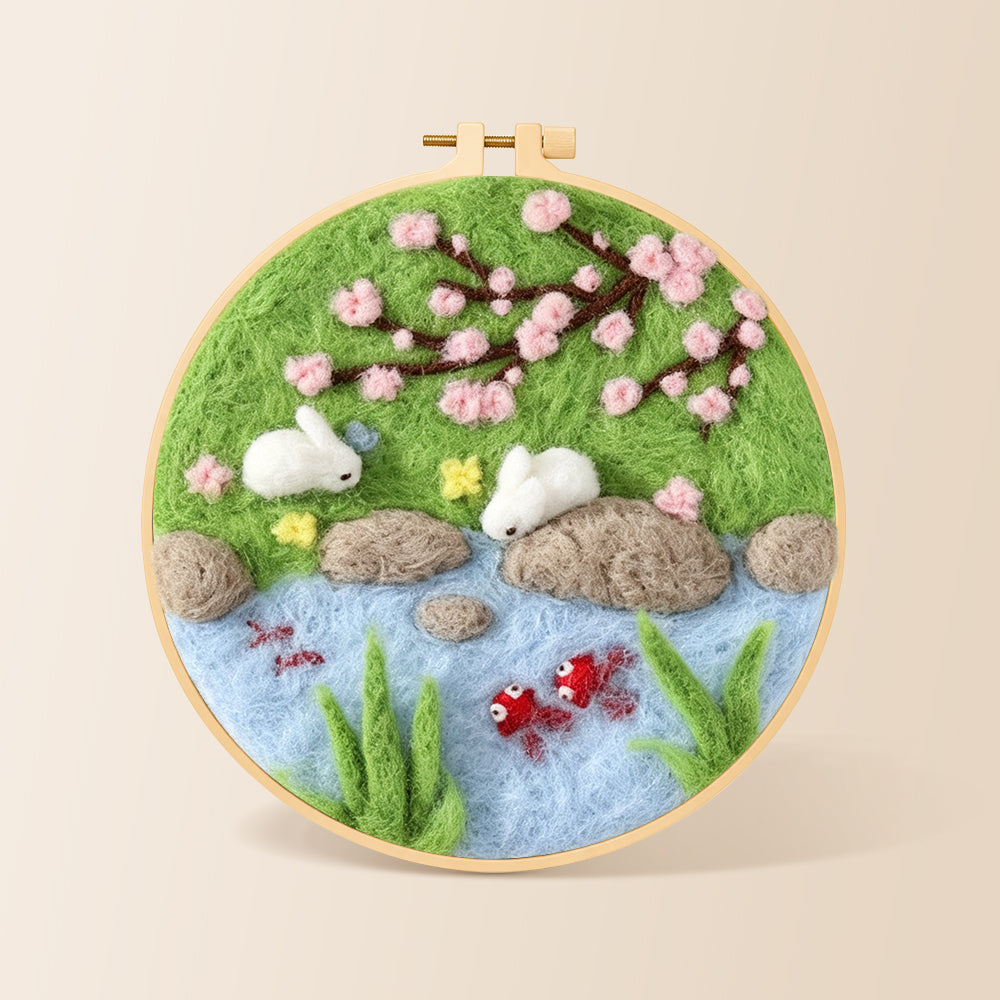 Rabbits fishing under cherry blossoms needle felting kit for beginners with a round wooden frame