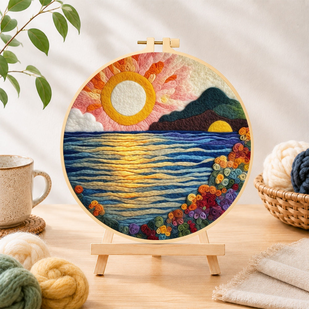 Finished radiant sun, blooming roses and blue waves needle felting displayed on a wooden easel