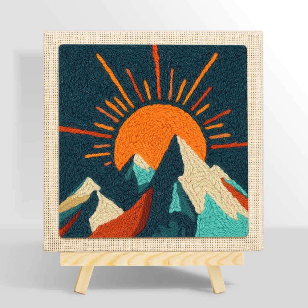 Radiant sunburst and snowy peaks punch needle kit for beginners
