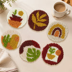 Rainbow and plant punch needle coasters used for home decoration