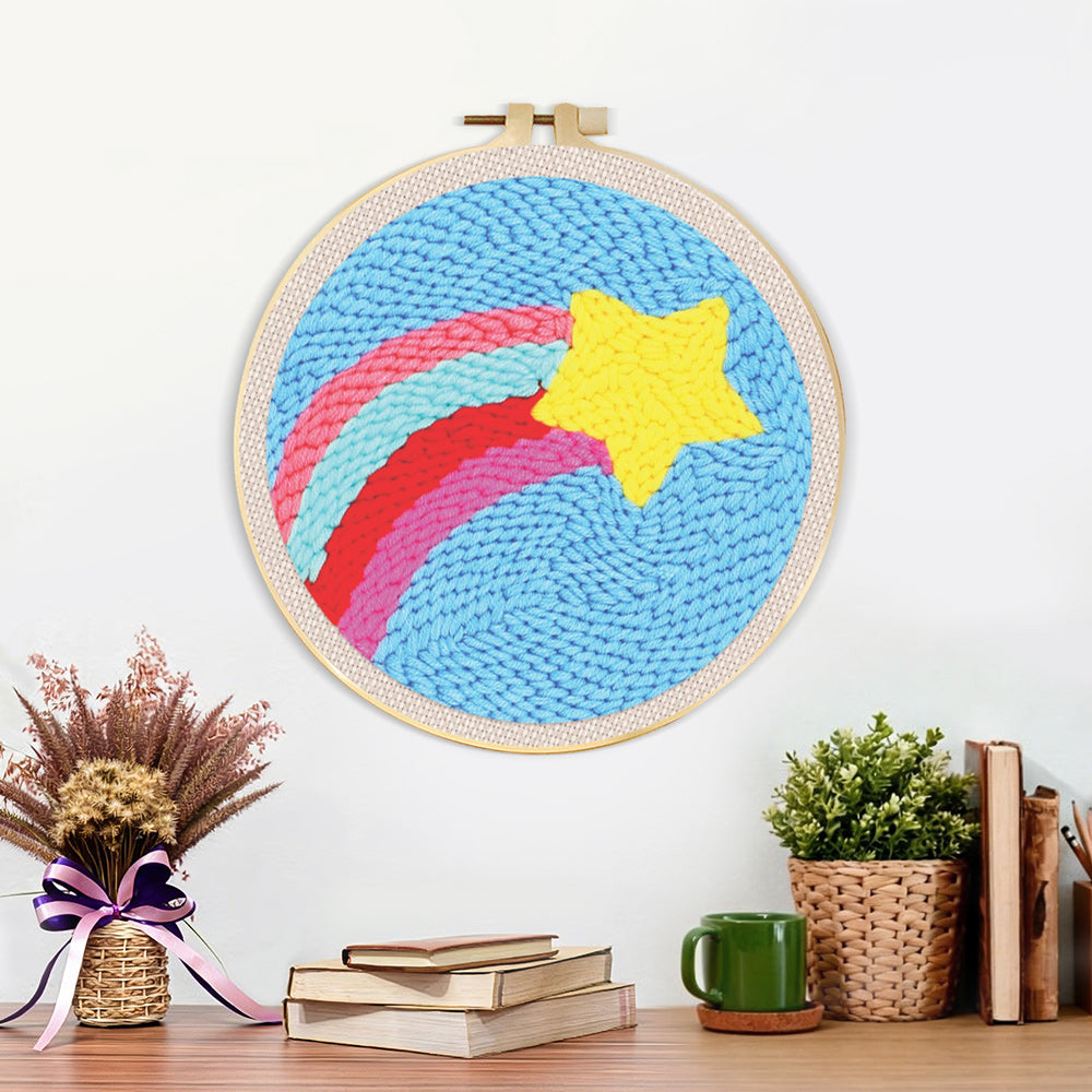Finished rainbow arcs and star artwork displayed on a wall