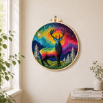Rainbow aurora stag needle felt wall art displayed in a bright home interior