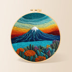 Rainbow layered sky and snow-capped mountain needle felting kit for beginners with a round wooden frame