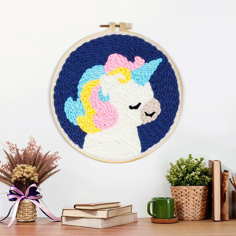 Finished rainbow mane unicorn artwork displayed on a wall
