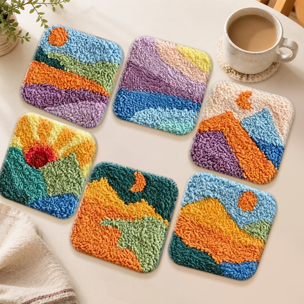 Rainbow mountains and sunrise punch needle coasters used for home decoration