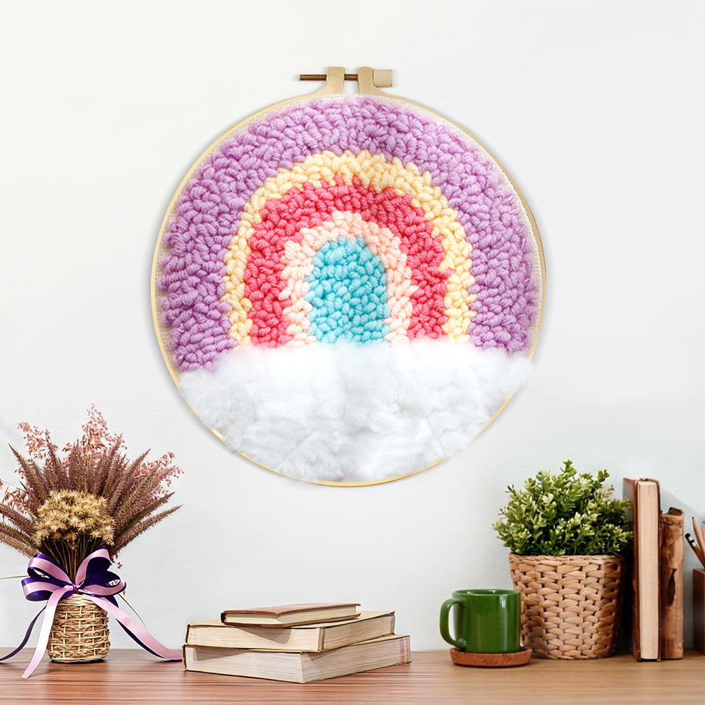 Finished rainbow over clouds artwork displayed on a wall