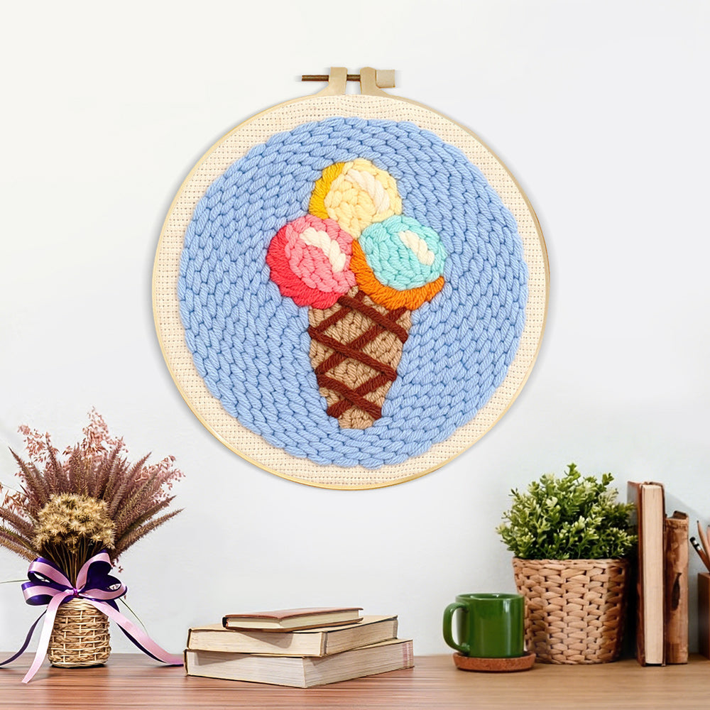 Finished rainbow scoop ice cream cone artwork displayed on a wall