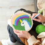 Creating handmade rainbow unicorn punch needle artwork