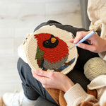 Creating handmade red cardinal bird punch needle artwork