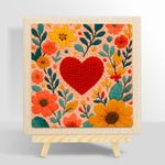 Red heart surrounded by colourful blooms punch needle kit for beginners