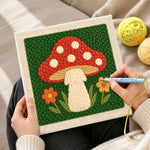 Creating handmade red mushroom with white spots punch needle artwork