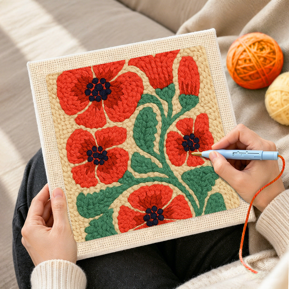 Creating handmade red poppies punch needle artwork